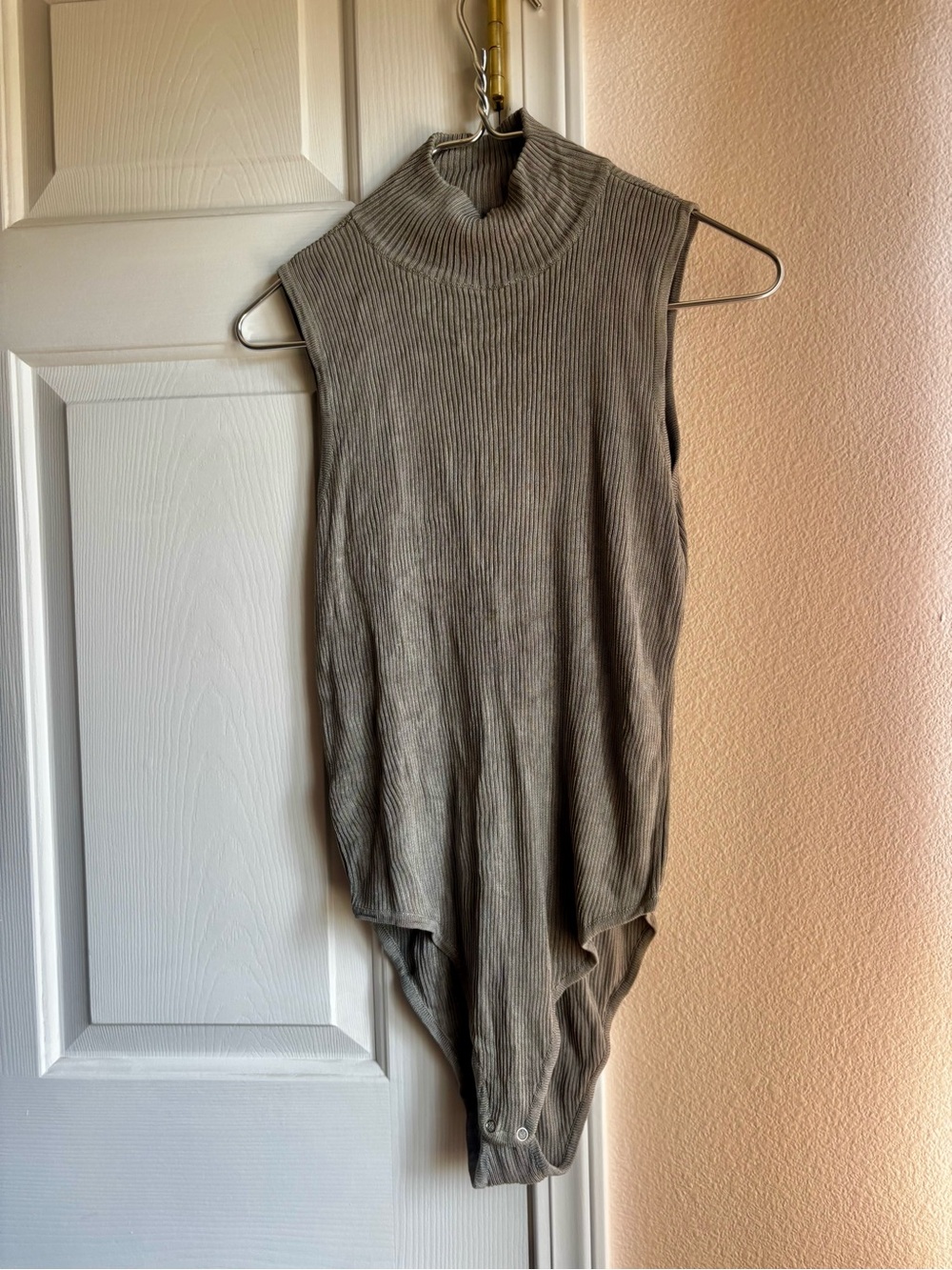 Sleeveless Ribbed Turtleneck Bodysuit in Taupe